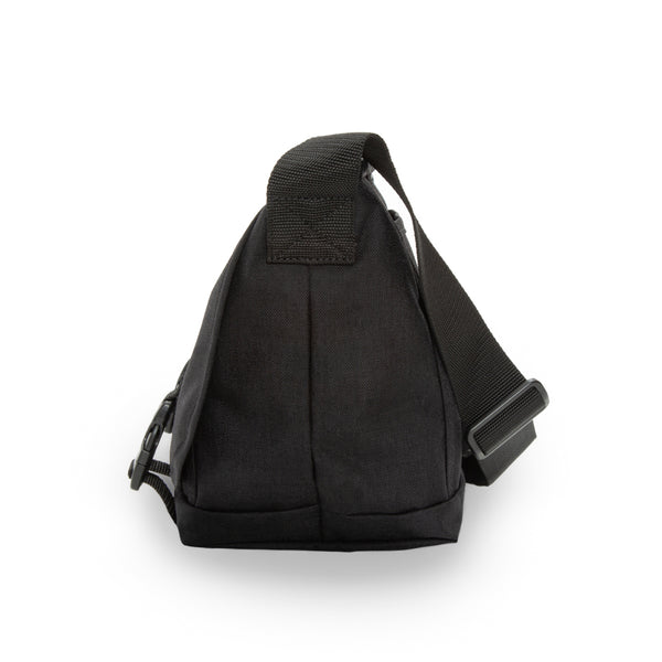 Black sling bag on a white background